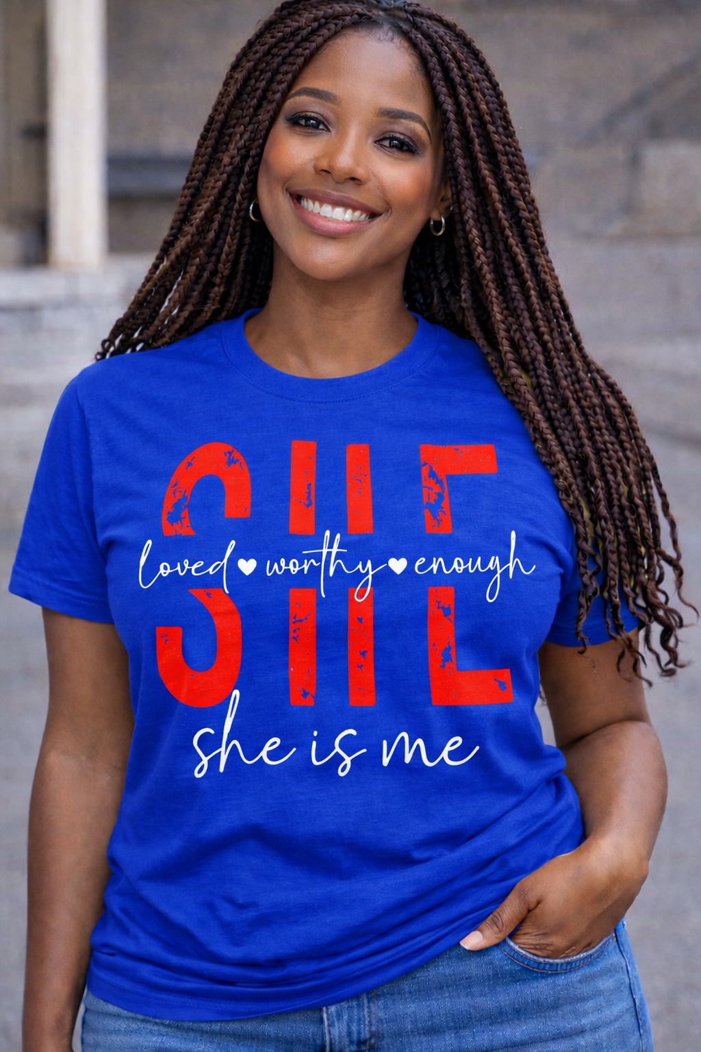 SHE IS